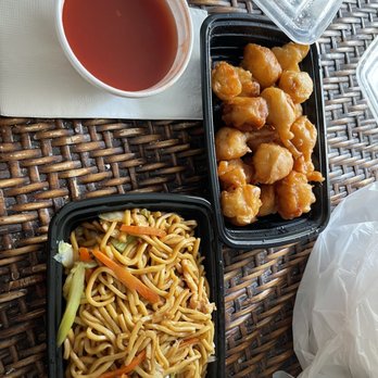 Colala Express - two takeout containers of chicken and noodles - Chinese Near Me - Lansing, Michigan Colala Express - two takeout containers of chicken and noodles - Chinese Near Me - Lansing, Michigan