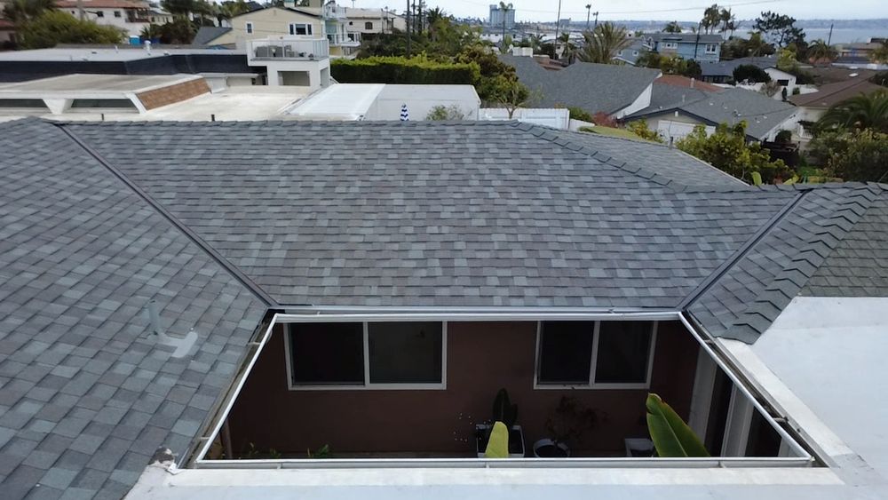 Slide of Vigil's Roofing