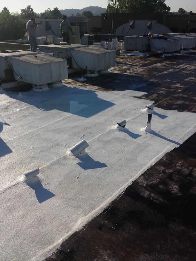 Slide of Advanced Roofing & Sons