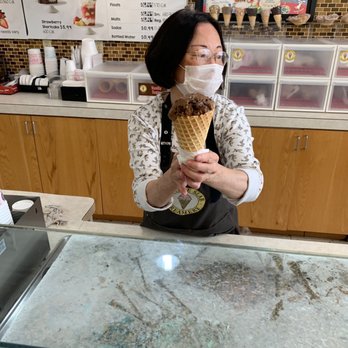 Marble Slab Creamery - The owner of Marble Slab handing me my Double Dark Chocolate cone - Ice Cream & Frozen Yogurt Near Me - Arlington, Texas Marble Slab Creamery - The owner of Marble Slab handing me my Double Dark Chocolate cone - Ice Cream & Frozen Yogurt Near Me - Arlington, Texas