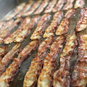 The Lunch Box - bacon cooking in a pan - Salad Near Me - Houston, Texas The Lunch Box - bacon cooking in a pan - Salad Near Me - Houston, Texas