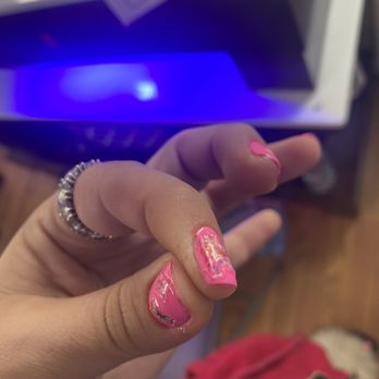 T.T Nails & Spa - trashy stickers bc lady can't do nails. slapped on the finger and splashed with clear polish & sunken into the pink polish - Nail Salons Near Me - East Syracuse, New York