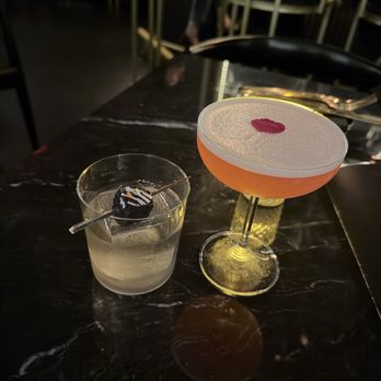 Noir Bar - Forbidden Fruit cocktail on the right - Bars Near Me - Orlando, Florida