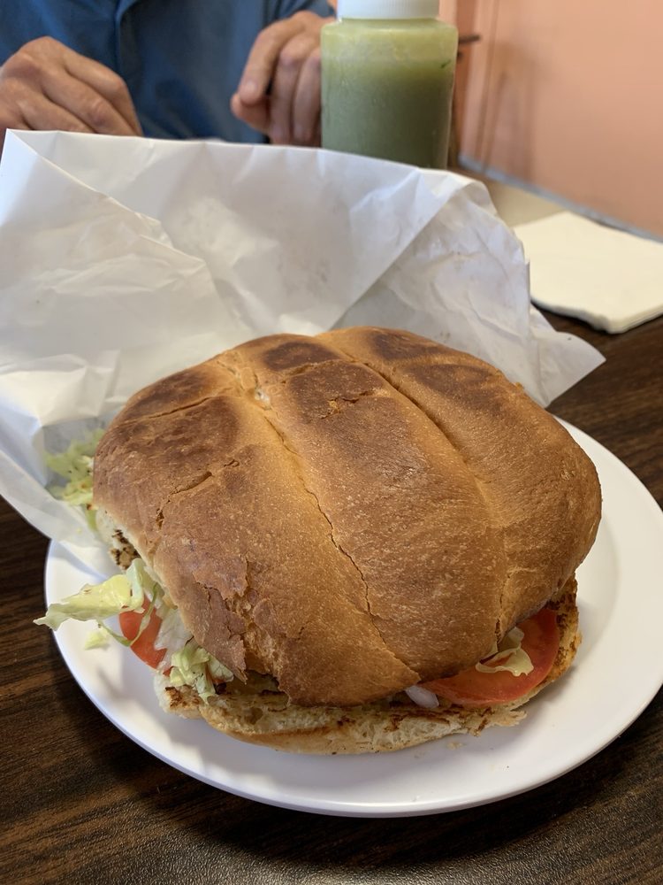 Taqueria Doña Mary Logo