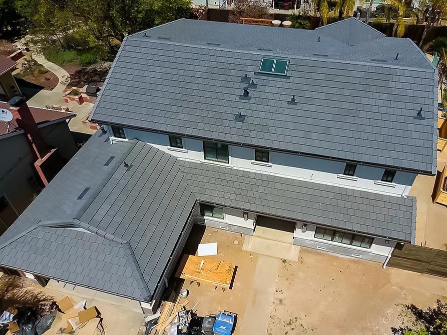 Slide of Mel's Roofing