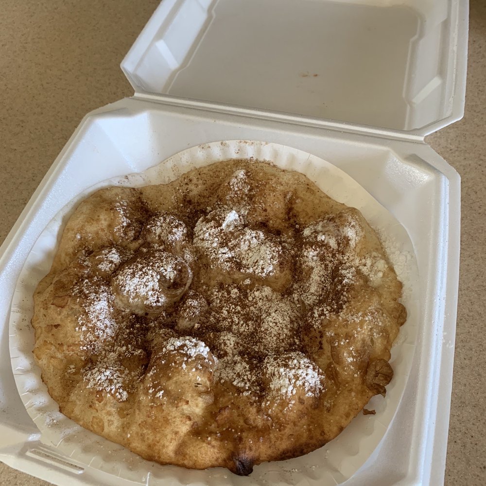 a pastry in a styrofoam container a pastry in a styrofoam container