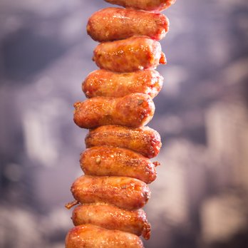Oliveira's Steak House - a skewer of sausages - Brazilian Near Me - Somerville, Massachusetts Oliveira's Steak House - a skewer of sausages - Brazilian Near Me - Somerville, Massachusetts