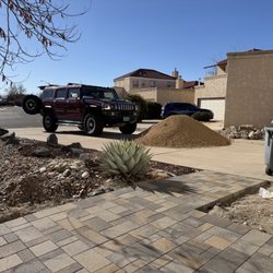 Buildology - Victorian Dimension 6 pavers with 7/16 Valley gold decorative gravel delivery in driveway.