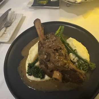 Boccaccio Ristorante - Agnello (slow-cooked lamb shank, braised in a luxuriously rich red wine sauce served with a side of mashed potato and broccolini) - Italian Near Me - Toronto, Ontario Boccaccio Ristorante - Agnello (slow-cooked lamb shank, braised in a luxuriously rich red wine sauce served with a side of mashed potato and broccolini) - Italian Near Me - Toronto, Ontario