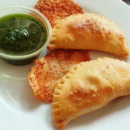 Cheese empanadas with chimichurri sauce ($7) Cheese empanadas with chimichurri sauce ($7)