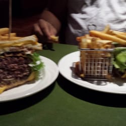 Timbers - The Monster Burger for two: 2.5 lbs of meat, 6 strips of bacon, grilled cheeses as buns and a pound of fries.....super yummy!!!