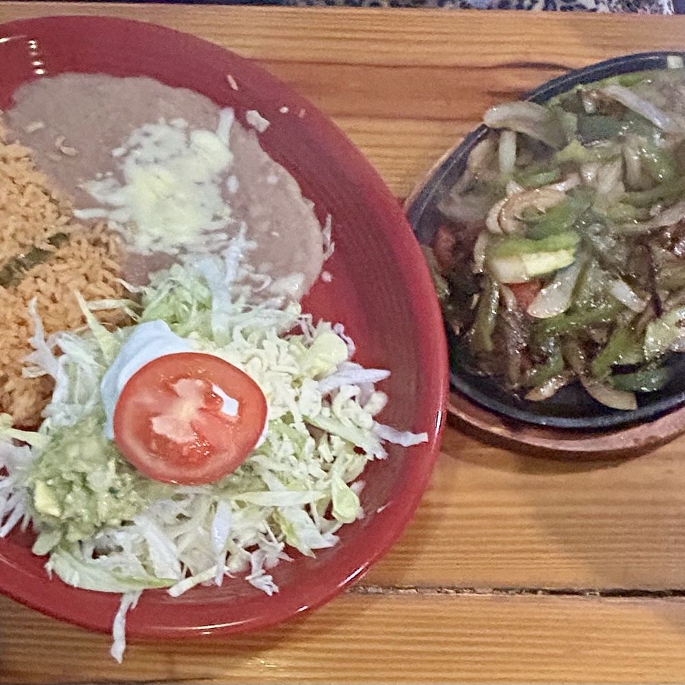 Mariscos Vallarta Mexican Grill - Veggie Fajitas- bell pepper, onions, mushrooms, zucchini, and tomatoes. rice and beans, lettuce, and sour cream, guacamole. $12.49 - Tex-Mex Near Me - Dunnellon, Florida Mariscos Vallarta Mexican Grill - Veggie Fajitas- bell pepper, onions, mushrooms, zucchini, and tomatoes. rice and beans, lettuce, and sour cream, guacamole. $12.49 - Tex-Mex Near Me - Dunnellon, Florida