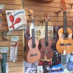 Island Music - Check out our Cordoba full size classical guitars, minis and ukes! Amazing sound, travel-ability, play-ablity....and just plain good looks!