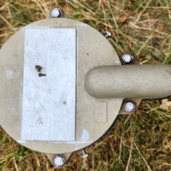 Groth Water Wells - Replace existing cover with this ground down, used, rusted one when the old one looked new bit had a different company's logo on it.