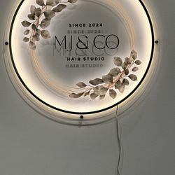 MJ & Co sign