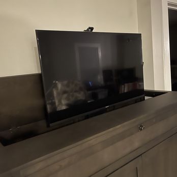 Alex Rylov - TV mounted on a tv cabinet lift system - Handyman Near Me Alex Rylov - TV mounted on a tv cabinet lift system - Handyman Near Me