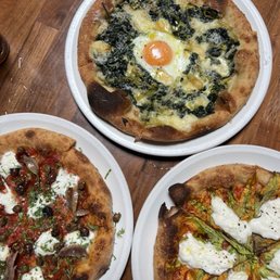 Nepoletana pizza, creamed spinach and leek, burrata with squash blossom