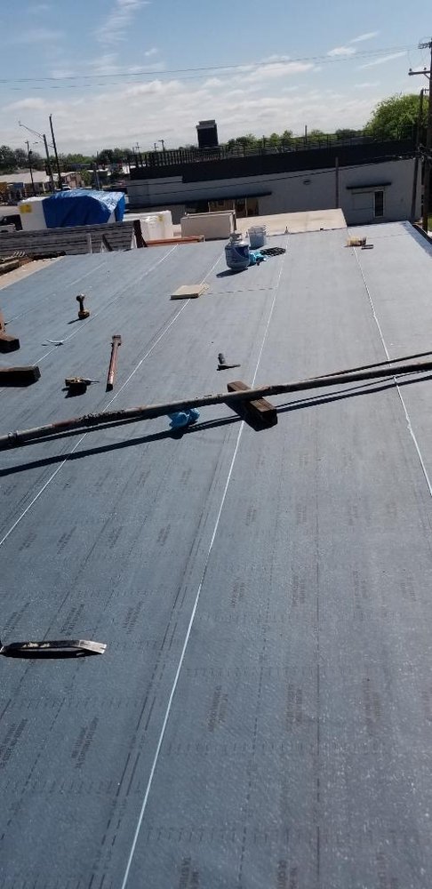 Slide of Trinity Roofing & Restoration