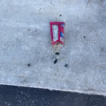 Extra Space Storage - This is by their loading door. Broken glass and candy wrapper. - Self Storage Near Me - Santa Cruz, California Extra Space Storage - This is by their loading door. Broken glass and candy wrapper. - Self Storage Near Me - Santa Cruz, California