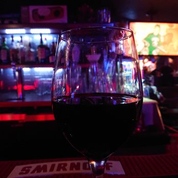 The Bend Lounge - a glass of wine on a table - Lounges Near Me - Edmonton, Alberta The Bend Lounge - a glass of wine on a table - Lounges Near Me - Edmonton, Alberta