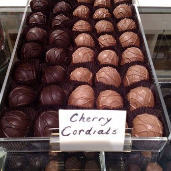 Sweets On the Hill - Dark and milk cherry cordials in the case. - Chocolatiers & Shops Near Me - West Seneca, New York Sweets On the Hill - Dark and milk cherry cordials in the case. - Chocolatiers & Shops Near Me - West Seneca, New York