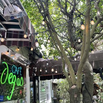 Cafe Degas - Quaint patio area. - French Near Me - New Orleans, Louisiana