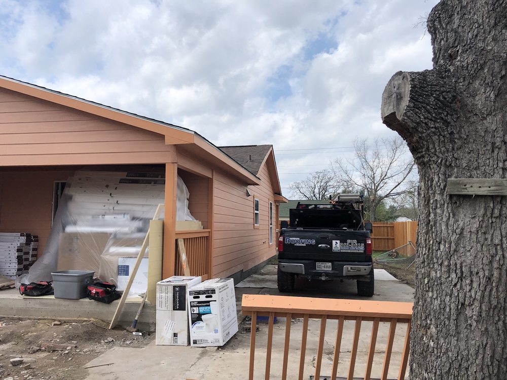 Slide of Salvador Roofing Services