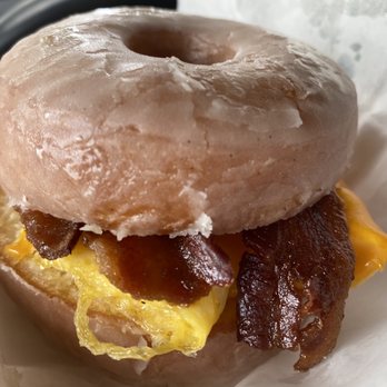 Sweet Alchemy Confectionery - Must try bacon, egg, and cheese breakfast sandwich served in an OG 24-hour tased brioche glazed donut. - Donuts Near Me - Davie, Florida