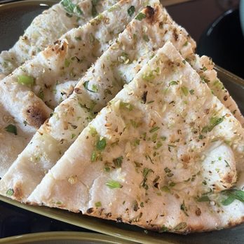 Taaza Indian Bistro - Chilli garlic naan - Indian Near Me - Clemmons, North Carolina Taaza Indian Bistro - Chilli garlic naan - Indian Near Me - Clemmons, North Carolina