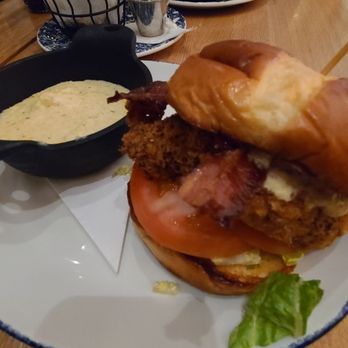 Tupelo Honey - Fried chicken BLT with a side of grits - Southern Near Me - Omaha, Nebraska