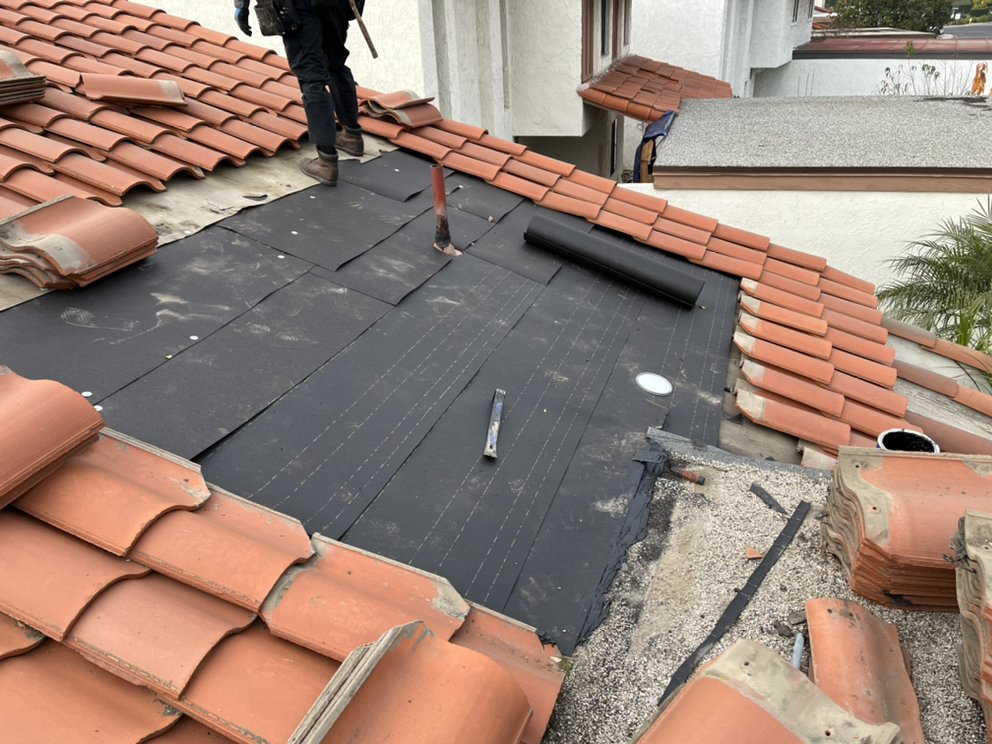 Slide of Torres Roofing