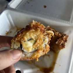 Segoku Hibachi - Cream cheese, avocado deep fried sushi. And spicy mayo