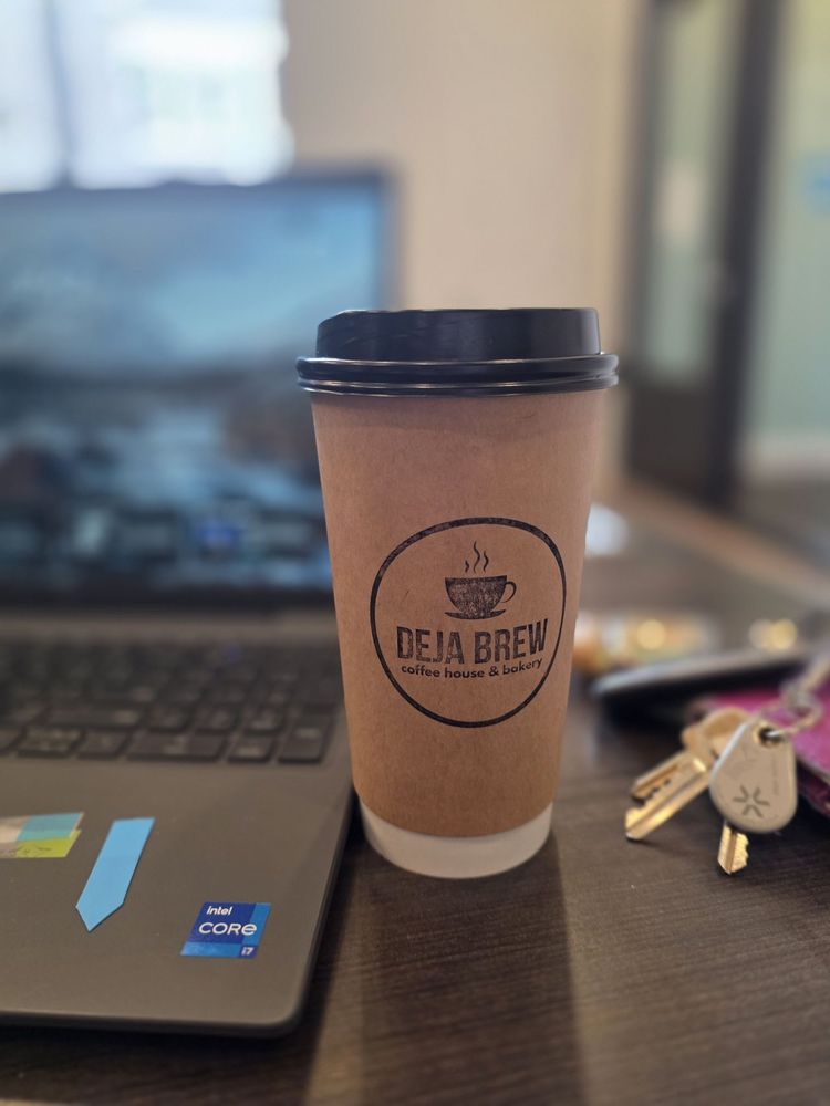 Deja Brew Coffee House & Bakery Logo