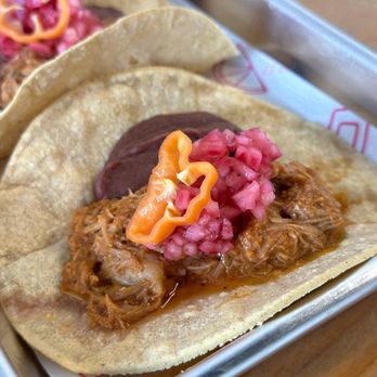 Tortilla House - COCHINITA PIBIL TACO...
Juicy tender and pulled pork on a corn tortilla, black beans, red onions, and sliced habanero peppers. - Tacos Near Me - Miami, Florida Tortilla House - COCHINITA PIBIL TACO...
Juicy tender and pulled pork on a corn tortilla, black beans, red onions, and sliced habanero peppers. - Tacos Near Me - Miami, Florida