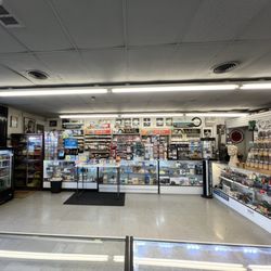 Cigarettes & Cigars For Less - Interior view