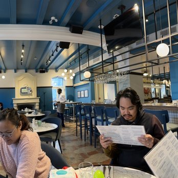 Les Mordus - a group of people in a restaurant - Brasseries Near Me - Quebec City, Quebec Les Mordus - a group of people in a restaurant - Brasseries Near Me - Quebec City, Quebec