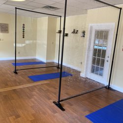 Water’s Edge Yoga - 3 mat set up with safety partitions
