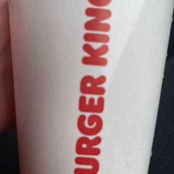 Burger King - a hand holding a cup of coffee - Burgers Near Me - Belleville, Michigan Burger King - a hand holding a cup of coffee - Burgers Near Me - Belleville, Michigan