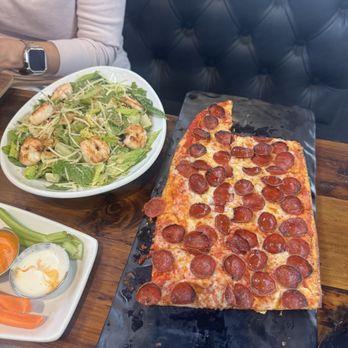Finney's Crafthouse - Orange - Flat bread pizza Ceaser salad with added shrimp - New American Near Me - Orange, California Finney's Crafthouse - Orange - Flat bread pizza Ceaser salad with added shrimp - New American Near Me - Orange, California