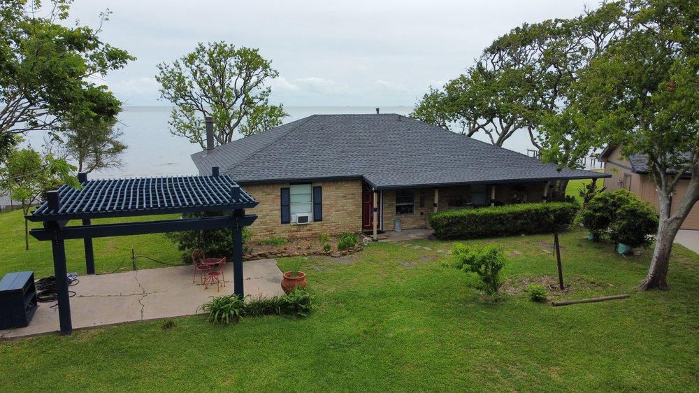 Slide of Lopez Roofing and Construction