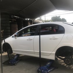 Genesis Tire Shop - My car getting new shoes thanks to Genesis Tires