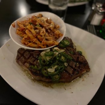 Carnivore - Spivey T-bone special and pasta with meat sauce - Steakhouses Near Me - St. Louis, Missouri