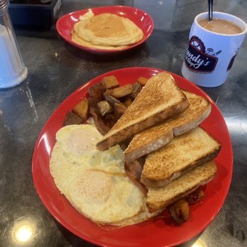 Randy's PitStop Diner - Eggs over easy, white buttered toast, potatoes, sausage, ham bacon and 2 pancakes. - Diners Near Me - Laconia, New Hampshire