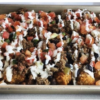 Bitter Tom’s Distillery - The yummy and large order of totchos. Get them!!! - New American Near Me - Lake Orion, Michigan Bitter Tom’s Distillery - The yummy and large order of totchos. Get them!!! - New American Near Me - Lake Orion, Michigan