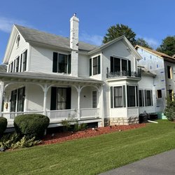 Over The Top Roofing - Two story addition with roof, and walls done