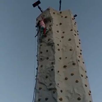 Hinkle Fun Center - Notice she is the only one on the Rock wall. Social distance conscious! - Mini Golf Near Me - Albuquerque, New Mexico