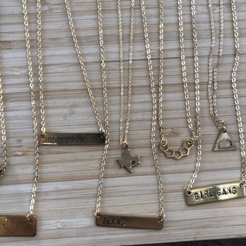 Space Montrose - Gold necklaces on display. - Arts & Crafts Near Me - Houston, Texas Space Montrose - Gold necklaces on display. - Arts & Crafts Near Me - Houston, Texas