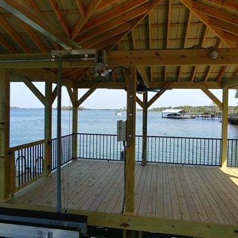 Lyfe Marine - a dock with a boat in the water - General Contractors Near Me - Cornelius, North Carolina