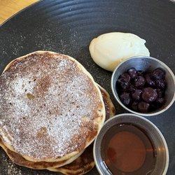 Maina - Buttermilk pancakes, 4 small  pieces which was more than enough for me.  Order bacon to give a more balanced flavor, sweet with savory!