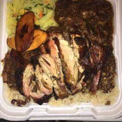 Ballo's Jerk House - A To-go combination of the famous Jerk Chicken Ox tails cabbage, rice and sweet plantains.